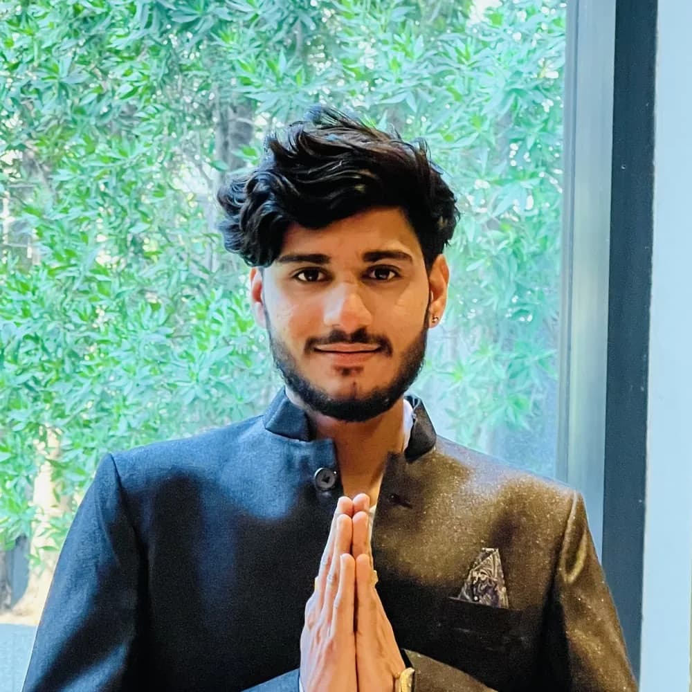 The astrologer of AstroVishalJoshi greeting with folded hands